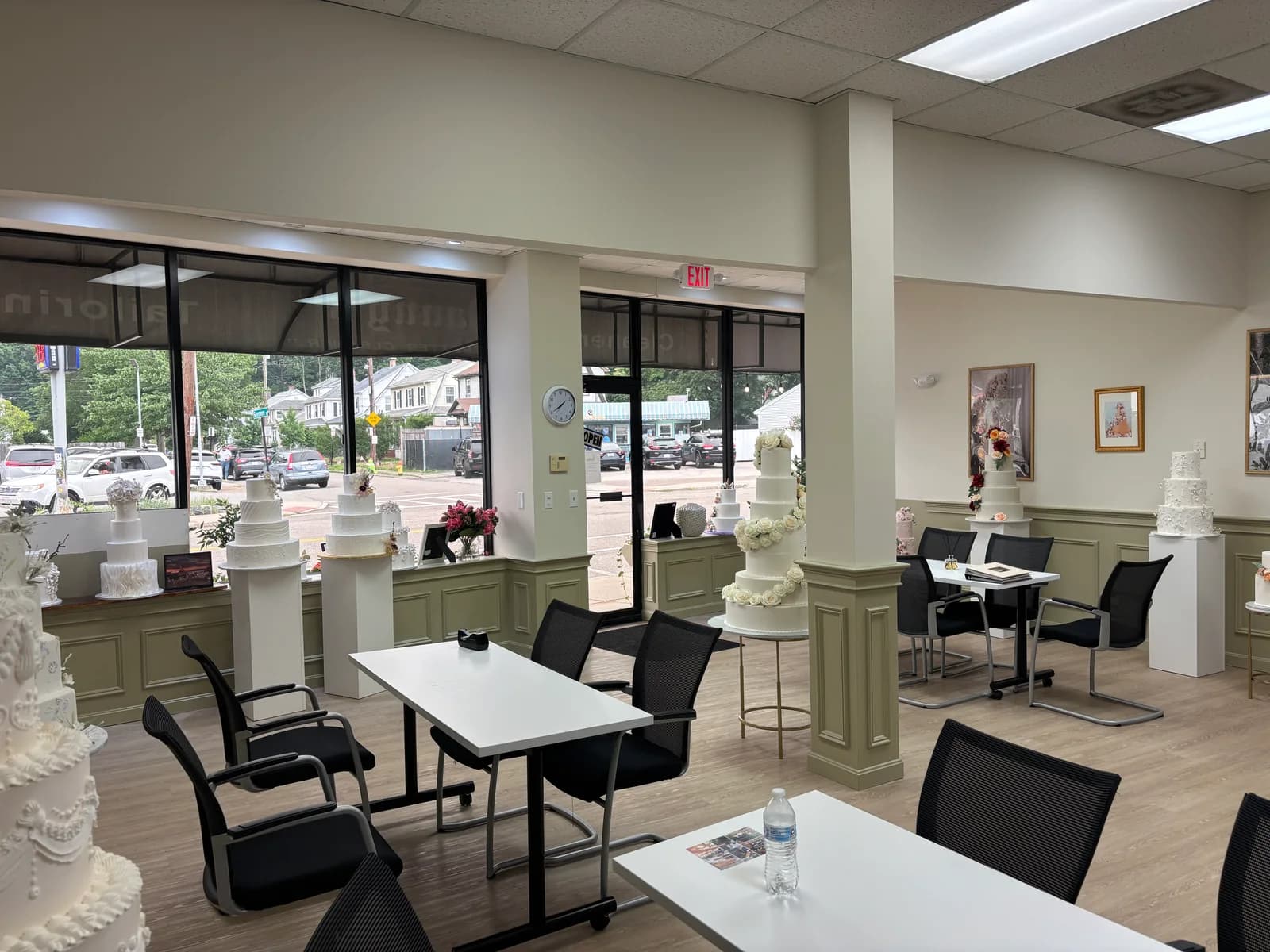 Finished commercial interior with recessed ceiling lights above seating areas