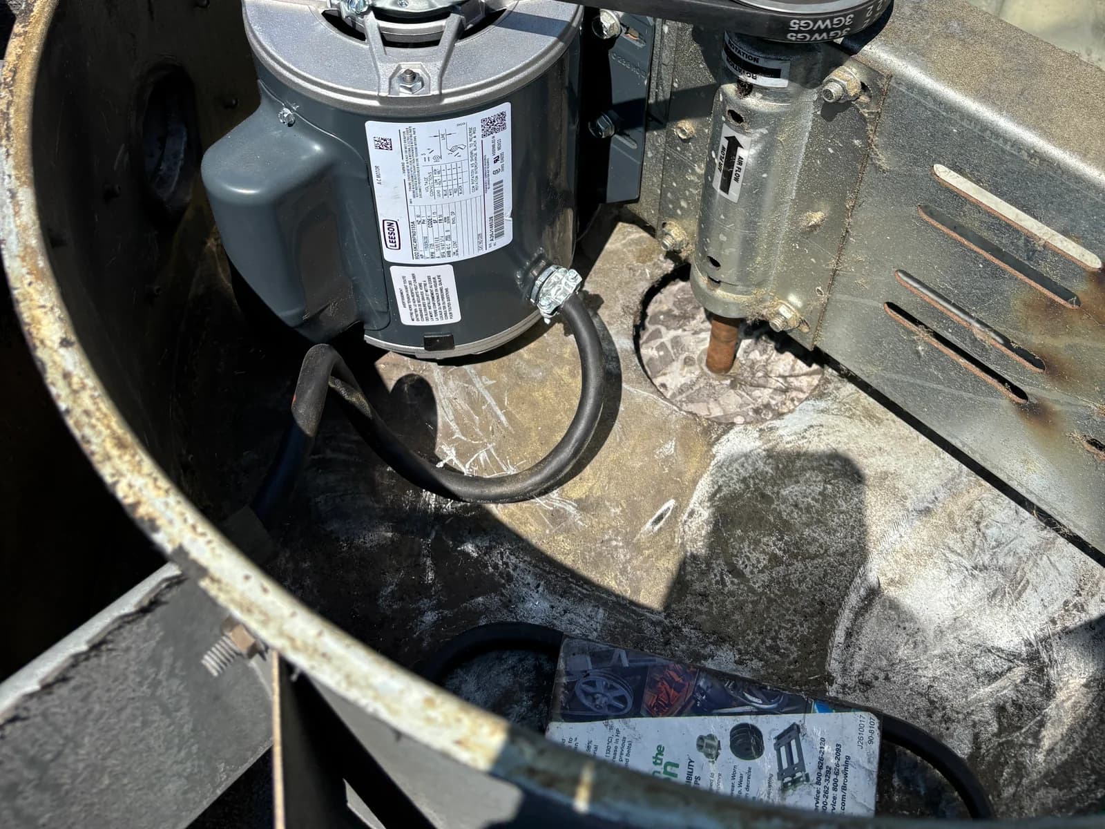 Electrical conduit connected to a motor inside an outdoor HVAC unit